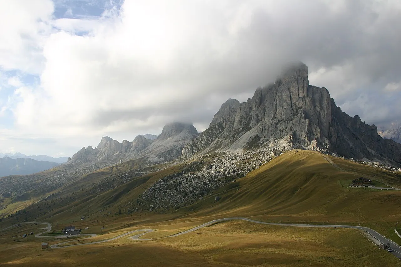 The sinuous Passo Giau road below Dolomite peaks near Cortina