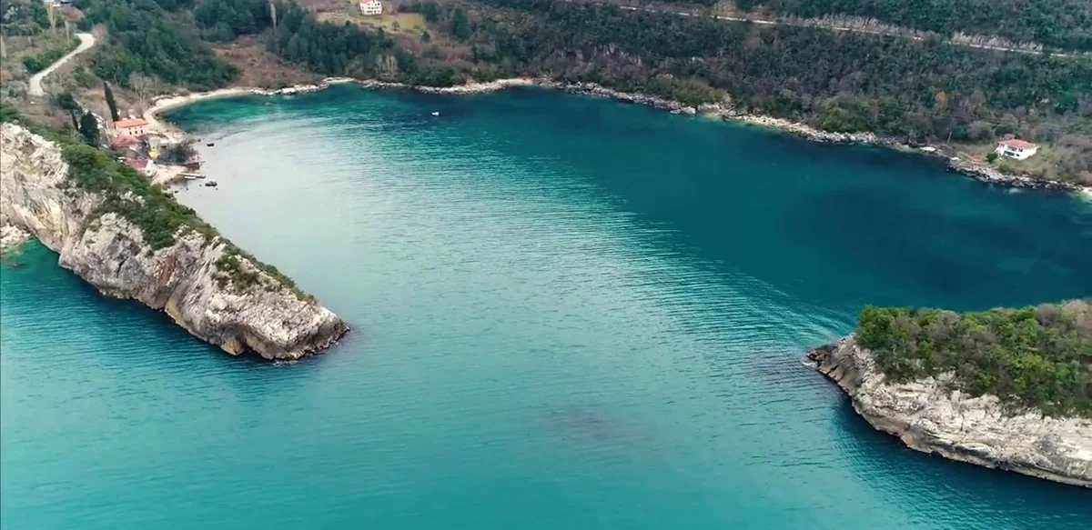 Gideros Cove, a near-enclosed natural harbour hidden from the open sea by mountains