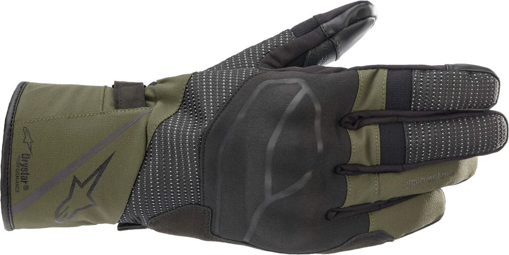 Alpinestars Andes V3 Drystar adventure motorcycle glove on a bike handlebar in mixed weather
