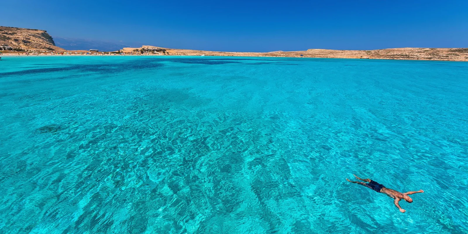 A turquoise rock-fringed bay on Koufonisia in the Lesser Cyclades