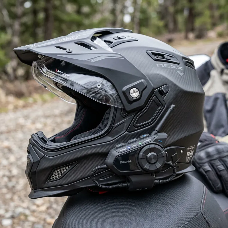 Motorcycle rider wearing helmet with side mounting area visible