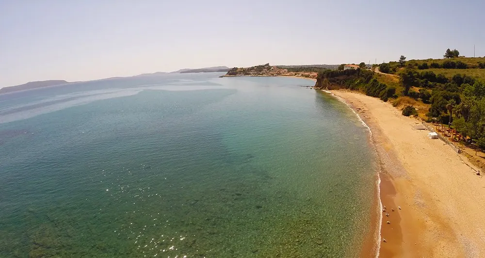 Seaside campsite on a sandy beach near Finikounda