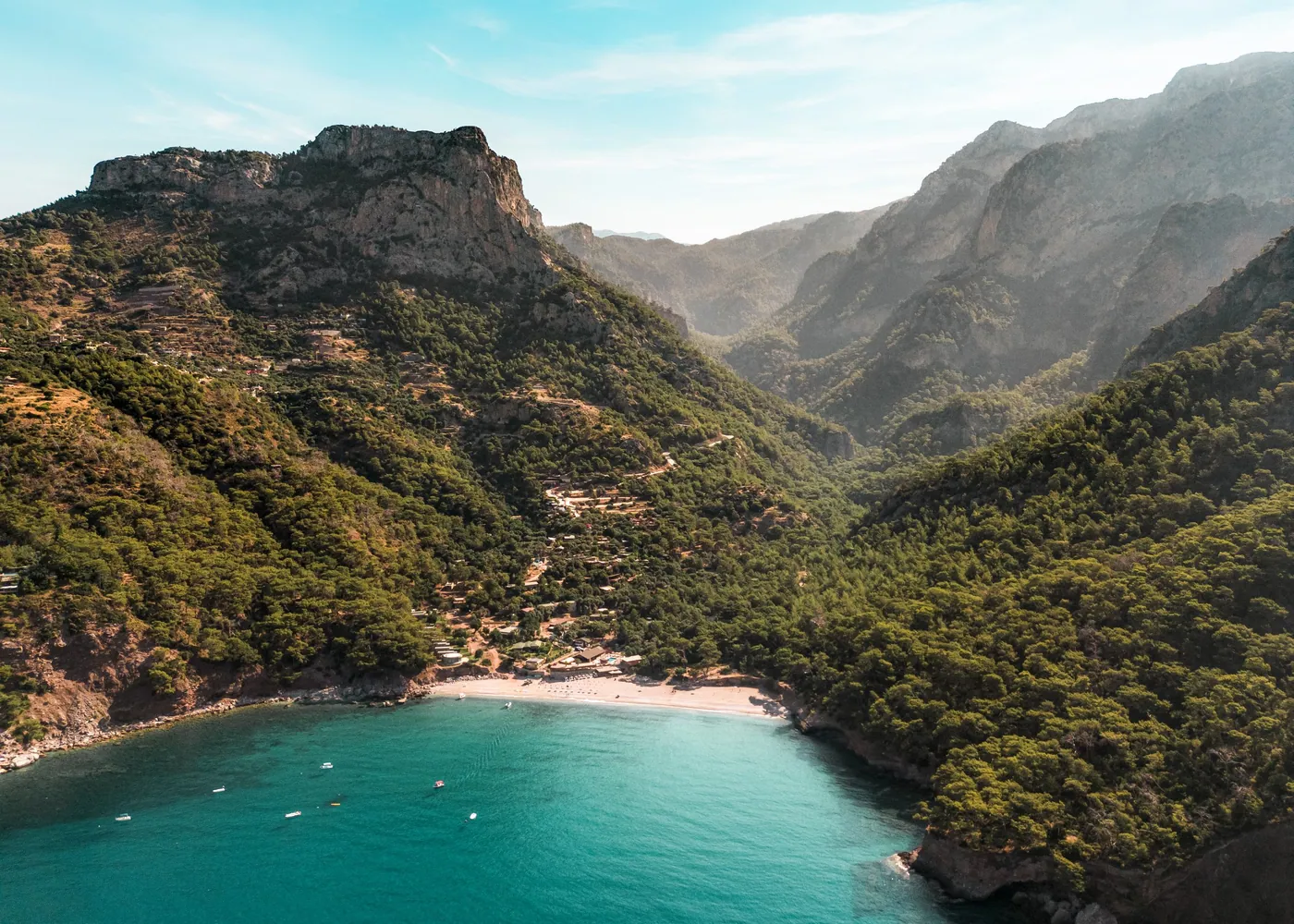 Kabak valley beach below pine-forested cliffs near Fethiye